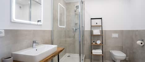 Hair dryer, towels, soap, toilet paper