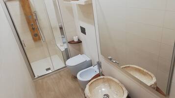 Hair dryer, bidet, towels, soap