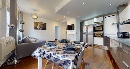 Charmant appartement au coeur des gratte ciel avec Jacuzzi