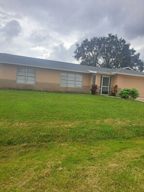 Exterior - This cozy house is family and pet friendly.  (Palm Bay)