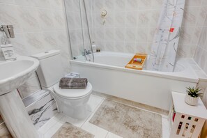 Hair dryer, towels, soap, shampoo