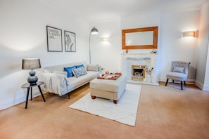 Smart TV, fireplace, books