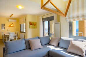 Senior Villa | Living area | 55-inch Smart TV with cable channels - Villa Calypso Elounda (Agios Nikolaos)