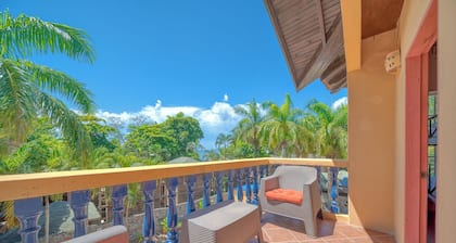 Three bedroom villa.Two private balconies. One full bathroom and 1 1/2 bath.