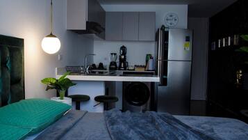 Fridge, microwave, stovetop, coffee/tea maker