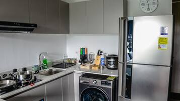 Fridge, microwave, stovetop, coffee/tea maker