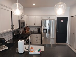 Fridge, microwave, oven, stovetop - HENDERSONS COMFORT HOME with Pool and Heated Jacuzzi in Henderson NV. (Henderson)