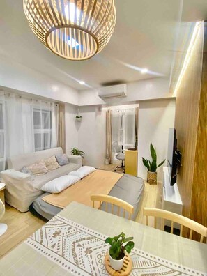 1 bedroom, iron/ironing board, WiFi, bed sheets - Condo in GMA Quezon City w/ Videoke & Parking (Quezon City)