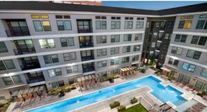 Experience the comfort and serenity of this contemporary hotel, featuring a modern design and a tranquil pool area.
