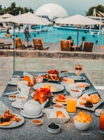 Daily buffet breakfast (USD 15 per person)