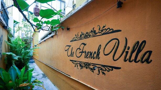 A wall with the text "The French Villa" in a decorative script. - The French Villa (Puducherry)