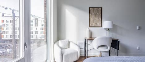 1 bedroom, desk, iron/ironing board, travel crib