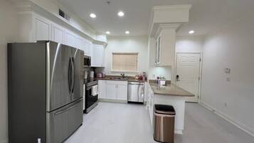 Microwave, stovetop, dishwasher, coffee/tea maker