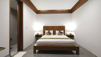 Deluxe villa | 2 slaapkamers, een minibar, een bureau, beddengoed