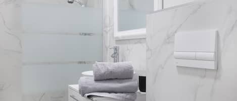 Hair dryer, towels, soap, toilet paper