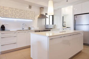 Family Apartment | Private kitchen | Full-sized fridge, microwave, oven, stovetop - Netanya Family Apt & Balcony by FeelHome (Netanya)