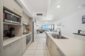 Fridge, microwave, oven, stovetop - Seaside Serenity: Apartment with Ocean Views (Kings Beach)