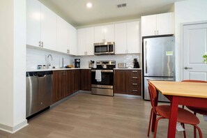 Fridge, microwave, oven, stovetop - Modern Nulu 2BR CozySuites 05 (Louisville)