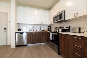 Fridge, microwave, oven, stovetop - Modern Nulu 2BR CozySuites 05 (Louisville)