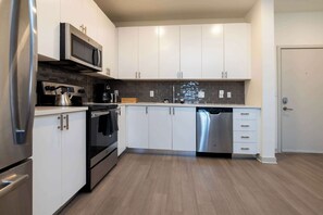 Fridge, microwave, oven, stovetop - Modern Nulu 2BR CozySuites 03 (Louisville)