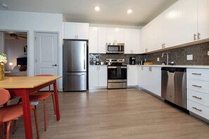 Fridge, microwave, oven, stovetop - Modern Nulu 2BR CozySuites 03 (Louisville)