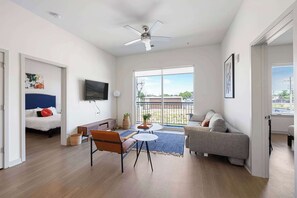 TV, offices - Modern Nulu 2BR CozySuites 06 (Louisville)