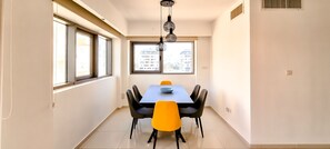 Deluxe Apartment | Dining room - Condo & Pool in New North by FeelHome (Tel Aviv)