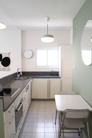 Comfort Apartment | Private kitchen | Full-sized fridge, microwave, oven, stovetop - Charming Old North near Park by FeelHome (Tel Aviv)