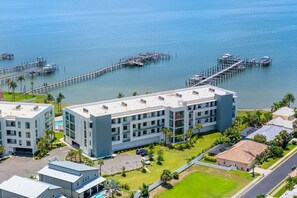 Exterior - Melbourne Riverfront condo by the beach, pool, hot tub, dock, washer/dryer  (Melbourne Beach)