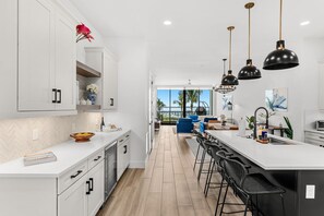 Fridge, microwave, oven, stovetop - Melbourne Riverfront condo by the beach, pool, hot tub, dock, washer/dryer  (Melbourne Beach)