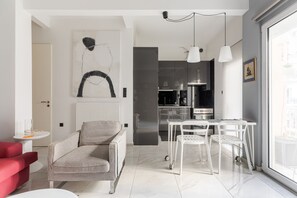 Appartement Ville | Coin séjour | TV connectée de 40 pouces avec chaînes par câble