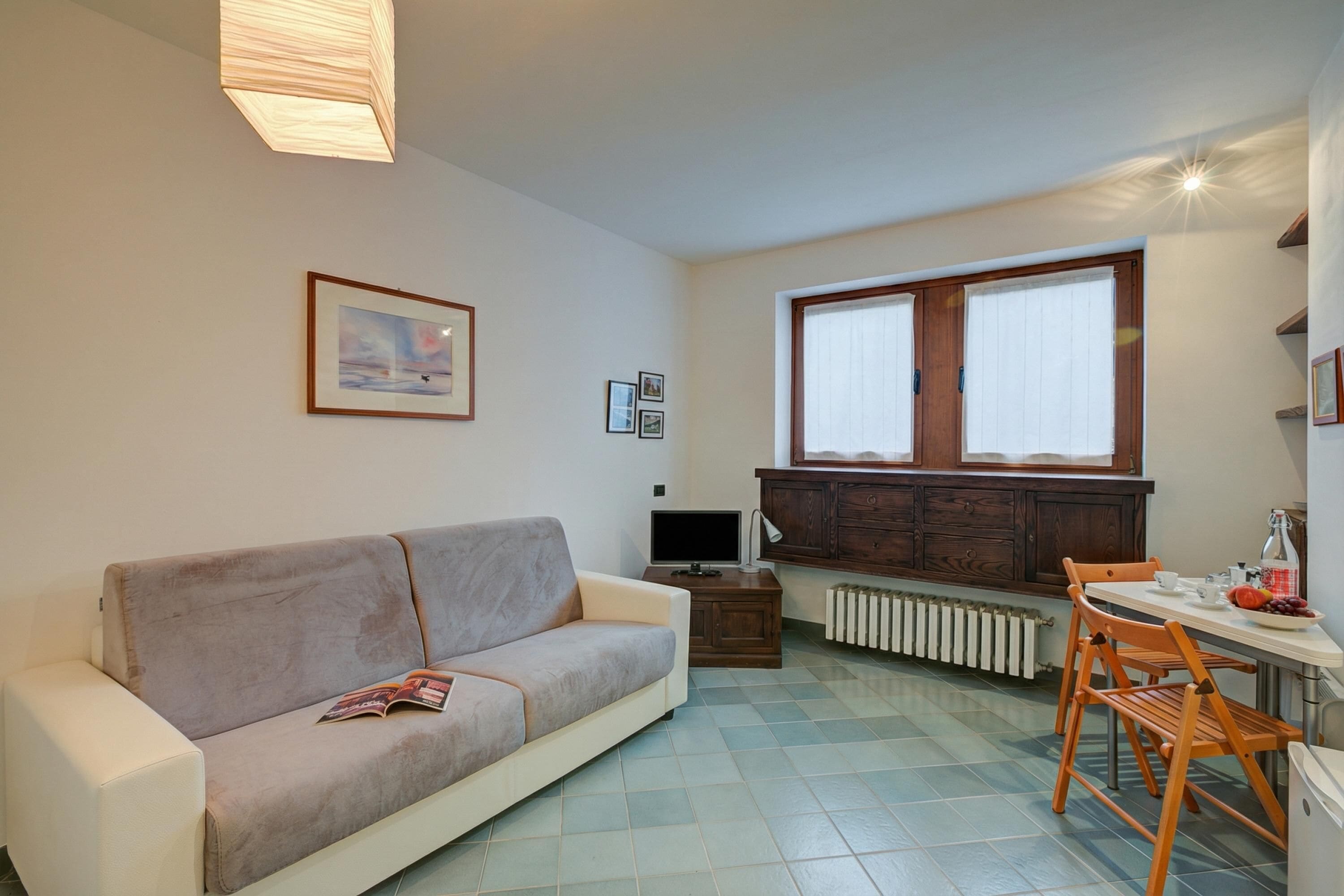 Family Studio, Mountain View (Fiori di Miele) | Living area | 21-inch flat-screen TV with digital channels, TV
