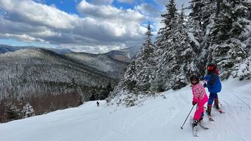 Cannon, Bretton Woods, Loon Mountain, Attitash, Wildcat... so many options nearby, you can ski a different mountain every day!