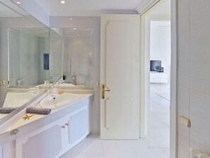Hair dryer, bidet, towels, soap
