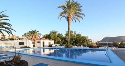 Apartamento con Piscina Comunitaria y Terraza Independiente