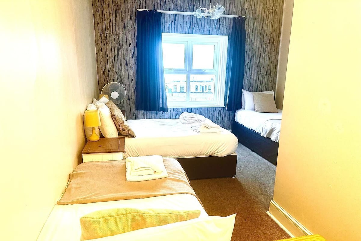 Standard Quadruple Room, Multiple Beds, Sea View | WiFi (free), bed sheets