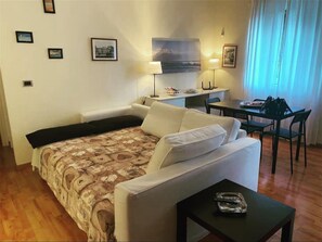 1 bedroom, desk, iron/ironing board, travel cot