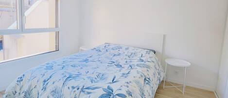 1 bedroom, desk, iron/ironing board, bed sheets