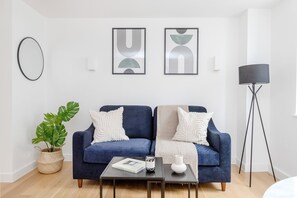 City Apartment | Living area | 40-inch Smart TV with satellite channels - Modern 1BR with Balcony by Soho (London)