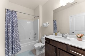 Hair dryer, towels, soap, toilet paper