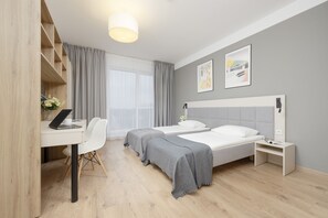 Studio, Kitchen | Desk, laptop workspace, iron/ironing board, bed sheets - Wolska Cozy Studio in Warsaw by Renters (Warsaw)