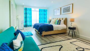 1 bedroom, desk, iron/ironing board, travel crib
