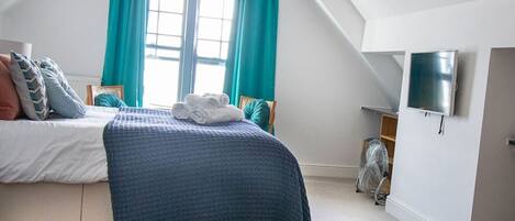 1 chambre, fer et planche Ă repasser, Wi-Fi gratuit, draps fournis