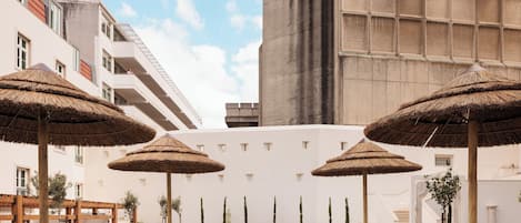 Seasonal outdoor pool, pool umbrellas, sun loungers