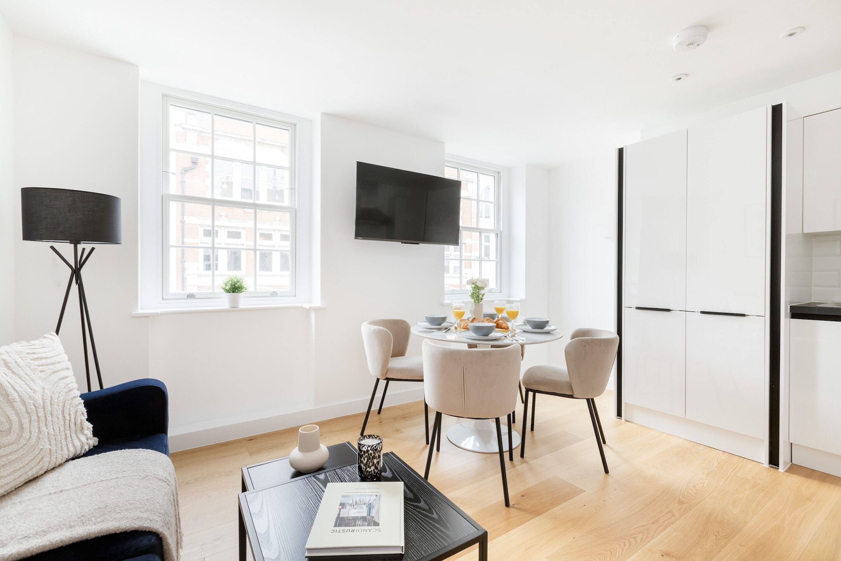 City Apartment | Living area | 40-inch Smart TV with satellite channels