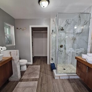 Shower, hair dryer, towels, soap