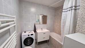 Hair dryer, towels, soap, shampoo