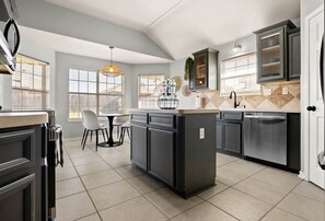 Coffee/tea maker, fridge, microwave, oven