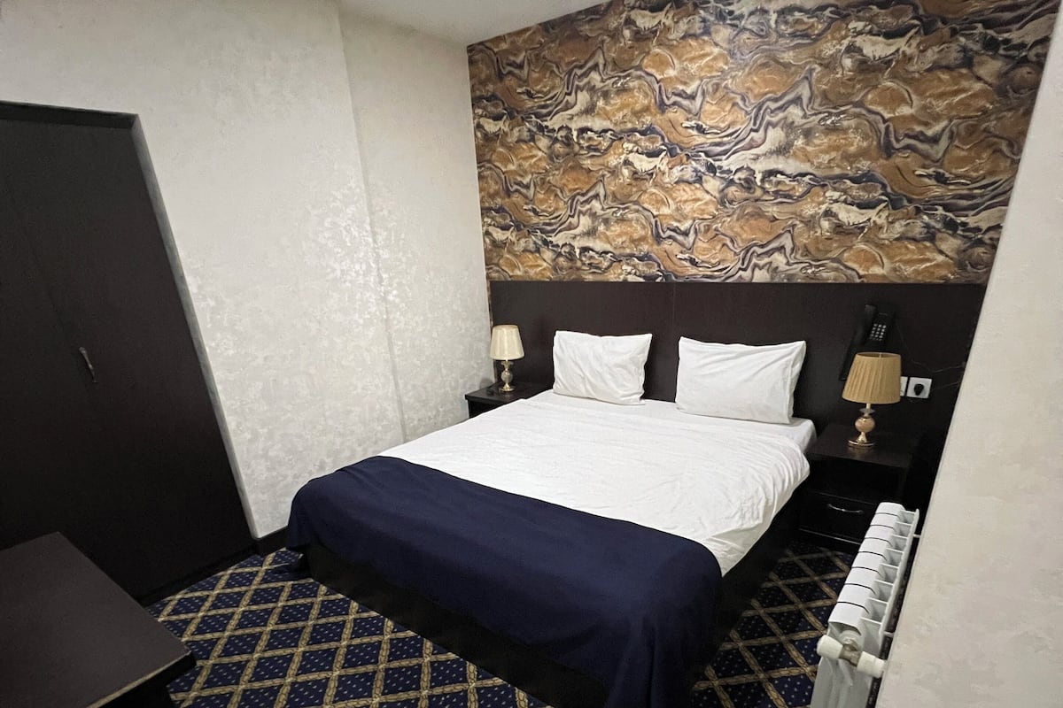 Economy Double Room | Minibar, desk, laptop workspace, soundproofing