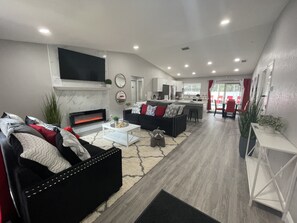 Smart TV, fireplace, books